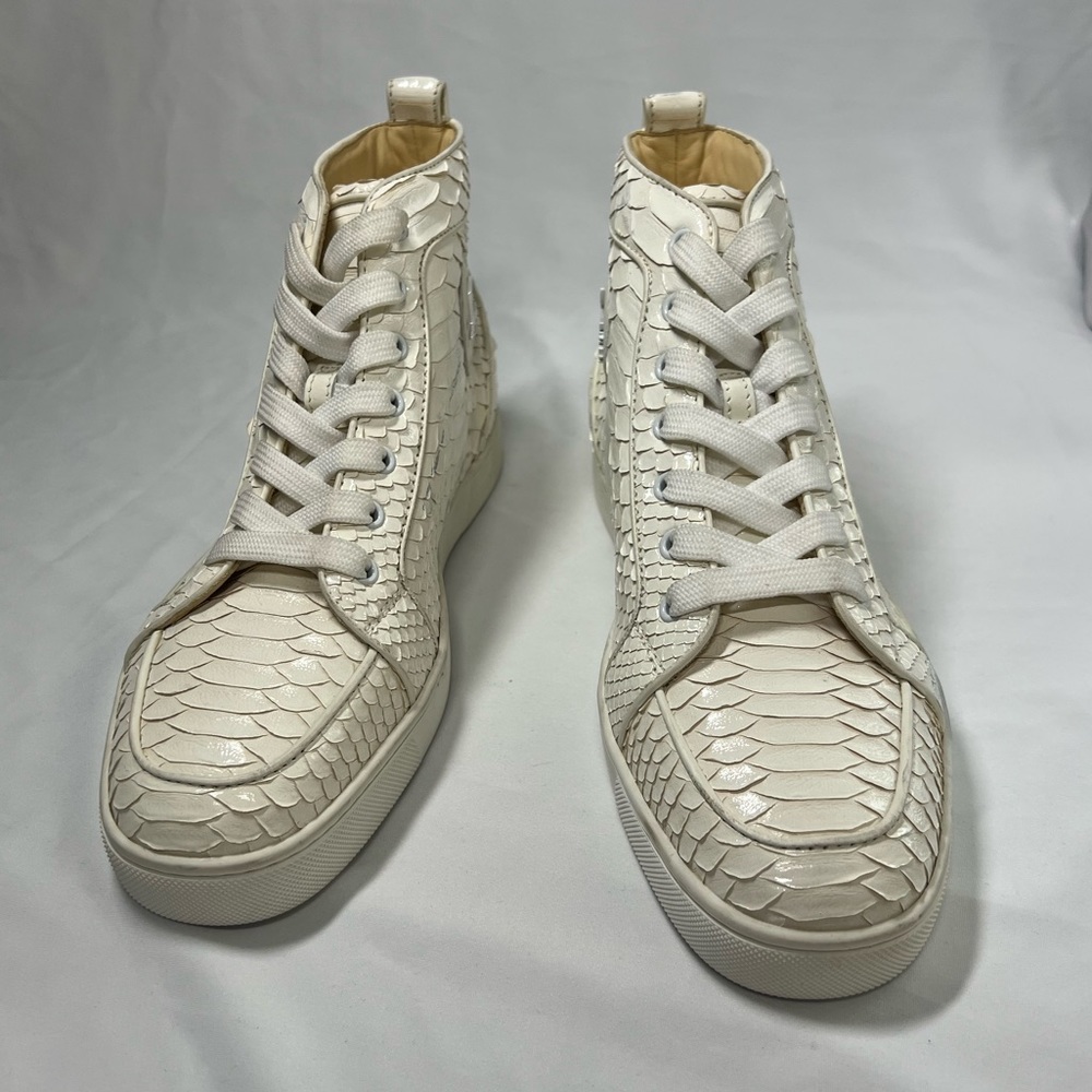 CHRISTIAN LOUBOUTIN
White Python sneakers